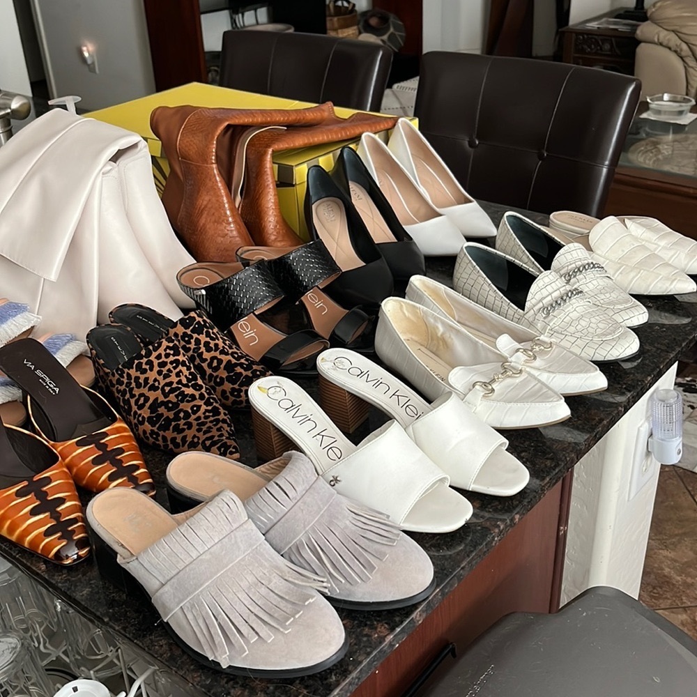 I am selling my size 8 wardrobe of woman’s designer shoes, 13 pair next to new!